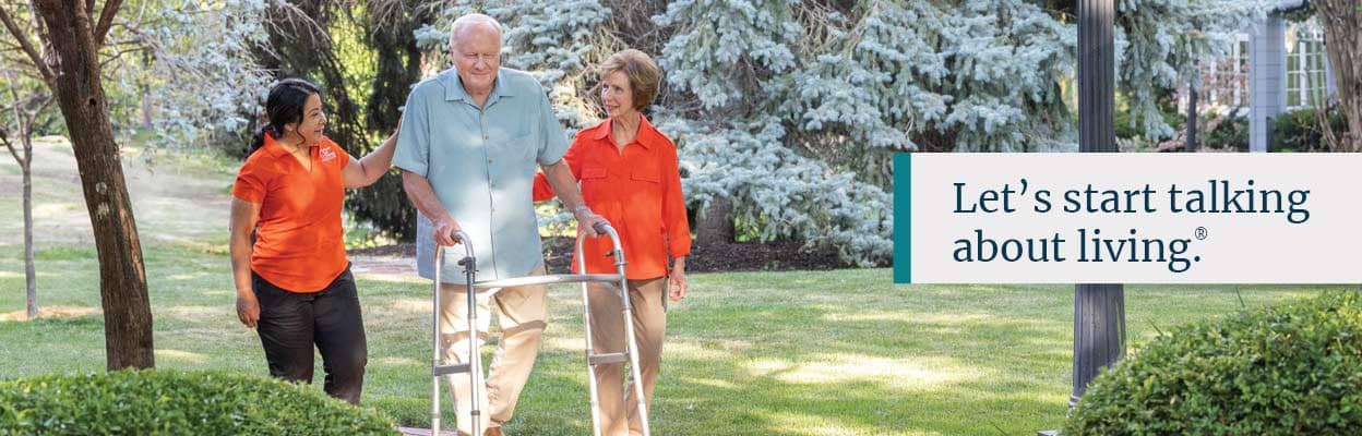 Older Woman and Carer Walking